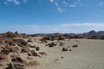 Fototapeta na wymiar Rocky volcanic landscape of caldera in Teide national park, Tenerife island