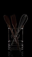 Kitchen accessories on a black background