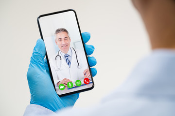 Man On Coronavirus Quarantine Calling Doctor