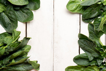 Bundle of spinach on white background