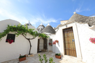 Cityscape of typical trulli houses in Alberobello Italy