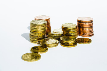 stacks of coins in white background
