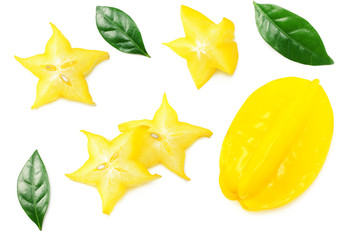 Fototapeta premium Yellow Carambola with green leaves and slices isolated on white background. top view