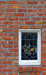 Red bricks wall and window