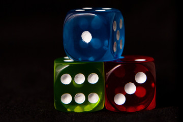 three blue, red,,green colored dice