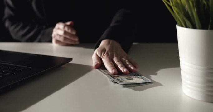 Honest female social worker declining bribe given by visitor, law compliance