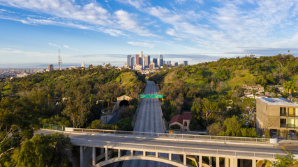 Aerial view of empty freeway streets with no people and no cars in downtown Los Angeles California as result of  coronavirus pandemic or COVID-19 virus outbreak and lockdown.