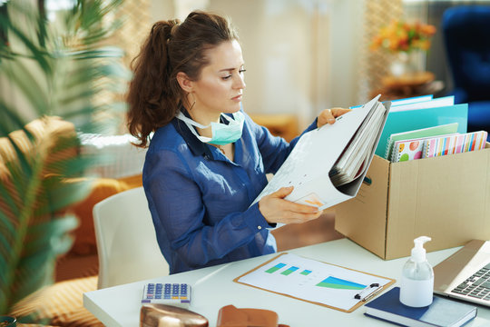 Trendy Female With Medical Mask Organising Home Office