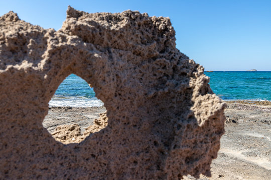 Rock with a wind hole in Pachena beach