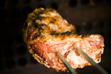 Meat grilled in the spit for barbecue