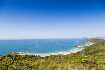 Fototapeta na wymiar A view of Praia Mole (Mole beach) and Galheta - popular beachs in Florianopolis, Brazil