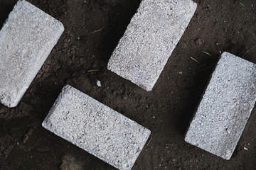 bricks, cement, and sand construction