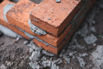 bricks, cement, and sand construction