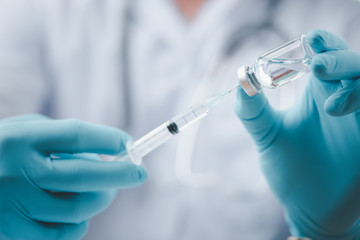 Concept fight against virus covid-19 corona virus, doctor or scientist in laboratory holding a...