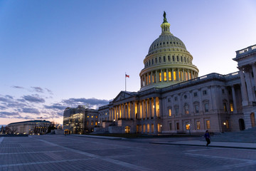 Washington Capitol at sunset with the lights on