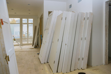 Interior construction of housing project with door installed