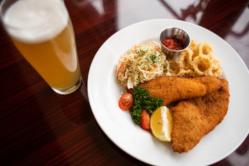 Fish Fry dish with beer on white plate