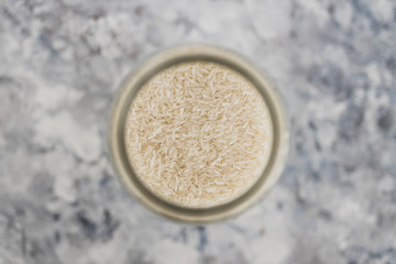 non-perishable food ingredients for vegan pantry, glass jars with oats flour and rice