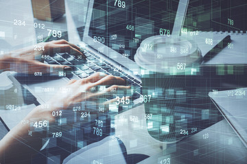 Double exposure of woman hands working on computer and data theme hologram drawing. Tech concept.
