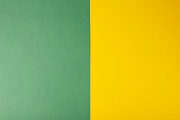 Fototapeta premium Lime green and yellow color paper background, texture, copy space.