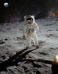 Astronaut on space mission with moon and earth on the background. Elements of this image furnished...