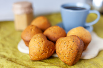 cupcakes hearts on a wooden board on a table