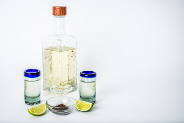 tequila bottle and glassware