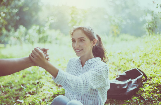 Man giving hand to happy woman,Suicide prevention,Mental health care concept