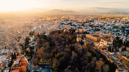 Obraz premium The Alhambra palace aerial view.Famous spanish attraction,fortress located Granada,Andalusia,Spain.UNESCO World Heritage Site in Spain.Arabic architectural monument in Granada