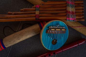 Top view of Afro-Peruvian instruments handmade in Peru. Concept of traditional Andean music © Dani