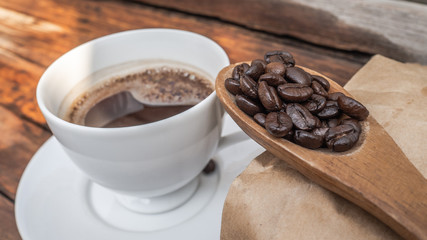 Dark rose Coffee Beans and coffee cup Background