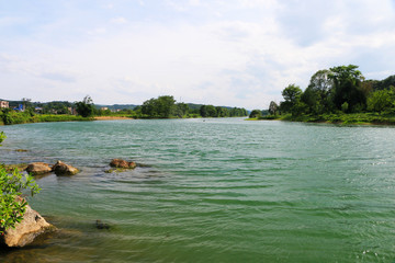 A village near a hill and a river