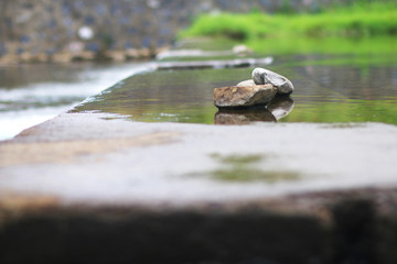 A stone in the water