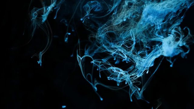 Smoke abstract. Cloud. Black background in blue light. Smoke effect.