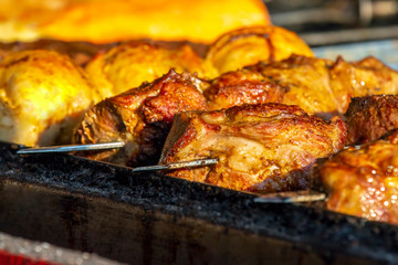cooking barbecue on the street. meat food. quick snack