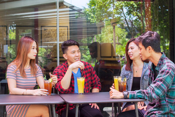 People chatting to each other in restaurant