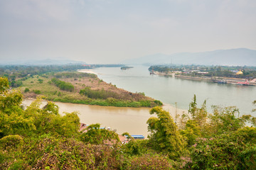 Fototapeta na wymiar view of golden triangle in chiang rai with 2 river color in contrast