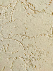  Beige textured decorative stucco background with place for text