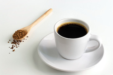cup of coffee with beans on white background
