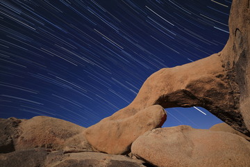 Star Trail over Arch Rock Joshua Tree National Park - 332565608