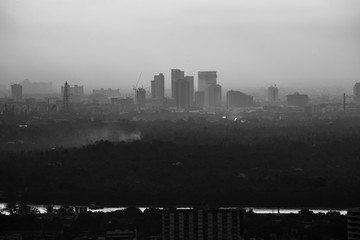 Dark city - dilhouettes of  skyscraper
