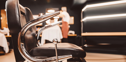 Barbershop armchair. Modern hairdresser and hair salon, barber shop for men