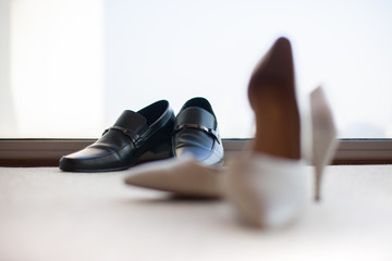 Couple shoes, Black leather shoes and bridal beige shoes, Groom wedding accessories.	