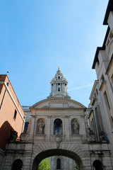 Statue on the arch of entrance to St Paul's Cathedral in a sunny afternoon, London UK