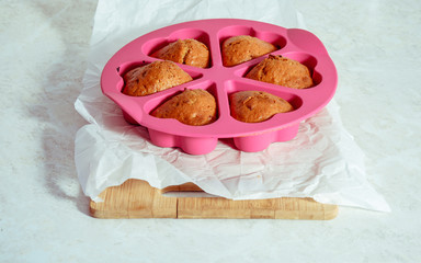 Homemade cupcakes on baking paper