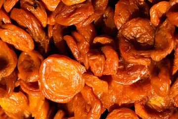 Dried apricots. Macro. Heap of dried apricots close-up.