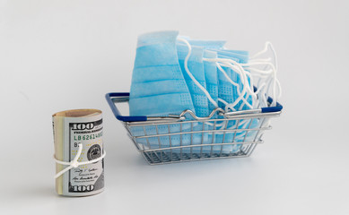 shortage of medical masks, price surge. Medical respiratory bandage face and money.