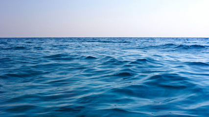 Fototapeta premium Blue waves on sea water surface