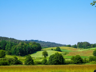 Fototapeta premium Hills, fields and meadows - beautiful landscape of Wiezyca.