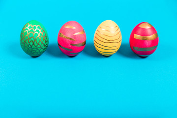 Colored easter eggs on a blue background